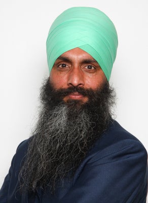 Portrait of Mandeep Singh Gill, Associate.